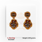 22kt gold long earrings with intricate maroon and white enamel work, floral lattice design, and studded accents, product code RJLE3681, weight 3.90 grams.