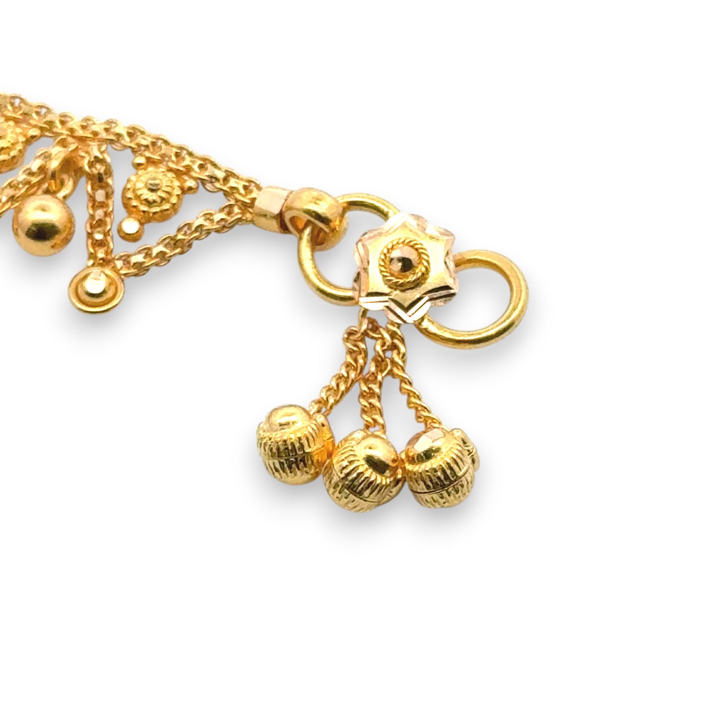 Regal Jewels RJLP3021B 22k yellow gold ladies payal anklet close-up view with handcrafted floral clasp, triple ghungroo dangles, and fine chain detailing, traditional Indian anklet design for women, elegant bridal and festive jewelry – Regal Jewels Chicago
