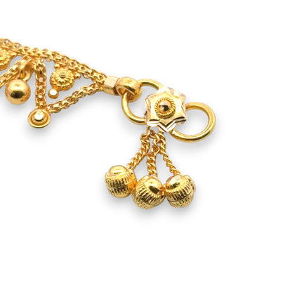 Regal Jewels RJLP3021B 22k yellow gold ladies payal anklet close-up view with handcrafted floral clasp, triple ghungroo dangles, and fine chain detailing, traditional Indian anklet design for women, elegant bridal and festive jewelry – Regal Jewels Chicago