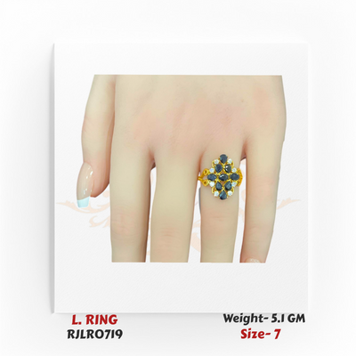 22k yellow gold ladies ring with a floral cluster of deep blue stones accented by white gems, displayed on a hand. Model RJLR0719