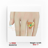 22k yellow gold statement ladies ring featuring a bold triangular design with red stones, white pearls, and a central green gem, shown on a hand. Model RJLR0723