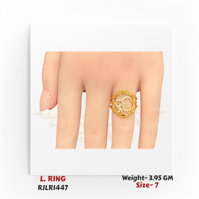 A 22kt gold Om symbol ladies ring with sparkling white stones, displayed on a model’s hand for size reference.