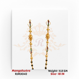 Close-up view of a traditional gold mangalsutra featuring dual symmetrical chain sections adorned with intricate filigree floral motifs and colorful enamel accents in red and green. The design transitions into a black-and-gold beaded lower chain, blending cultural elegance with vibrant detailing. Model RJM3042.