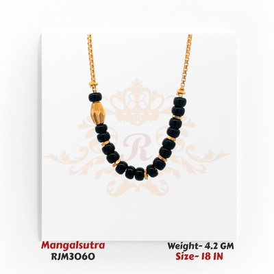 Close-up view of a minimalist gold mangalsutra featuring a sleek arrangement of glossy black beads separated by small gold spacers, accented with a single faceted gold bead on one side for an asymmetrical touch. Suspended from a fine gold chain, the design blends simplicity with modern elegance. Model RJM3060.