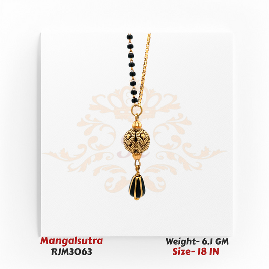 Close-up view of a traditional gold mangalsutra showcasing an ornate spherical pendant with detailed floral engravings, complemented by a teardrop-shaped black-and-gold accent bead. The pendant hangs from a black-and-gold beaded chain, highlighting its intricate craftsmanship. Model RJM3063.