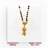 Close-up view of a traditional gold mangalsutra featuring intricately textured spherical beads, with a larger central bead adorned with diagonal patterns and small dangling gold ball accents. The pendant is suspended from a classic black-and-gold beaded chain for a timeless ethnic look. Model RJM3133.