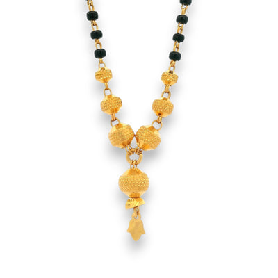 22k Gold Mangalsutra close-up of textured gold beads and hanging center design – Regal Jewels RJM3136A