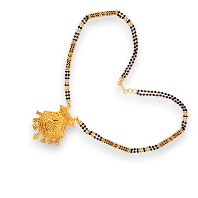 Traditional double-strand black bead mangalsutra with intricate gold pendant – Regal Jewels RJM3143B