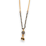 Contemporary 22k gold mangalsutra with round diamond-cut pendant and dual black bead chain – Regal Jewels RJM3147