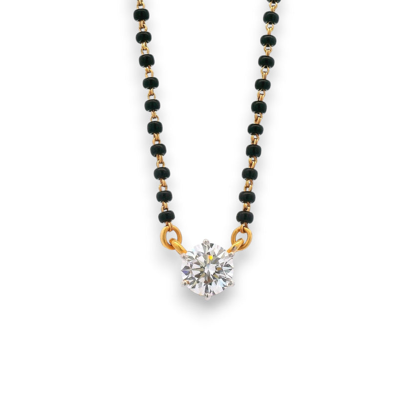 Close-up of solitaire diamond pendant mangalsutra on fine gold and black bead chain – RJM3149A by Regal Jewels