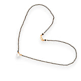 Delicate gold mangalsutra with round solitaire pendant and sleek black bead detailing – Regal Jewels RJM3149B