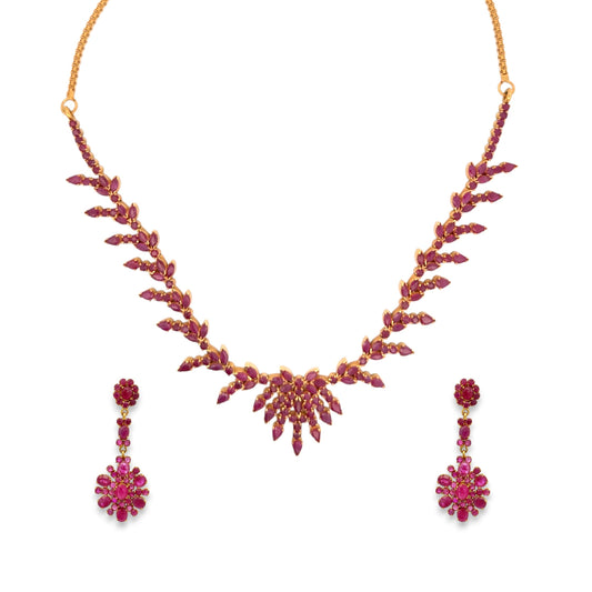 22K gold ruby necklace set with cascading leaf cluster design, floral ruby centerpiece, and matching drop earrings – 48.38 gm, RJOMS3046 – Regal Jewels Chicago.