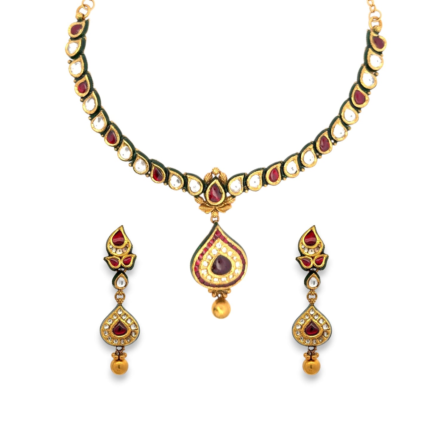 Elegant 22kt gold Kundan necklace set featuring teardrop motifs with red and white polki stones, green enamel edging, and matching earrings. Ideal for bridal, festive, and traditional occasions from Regal Jewels Chicago.
