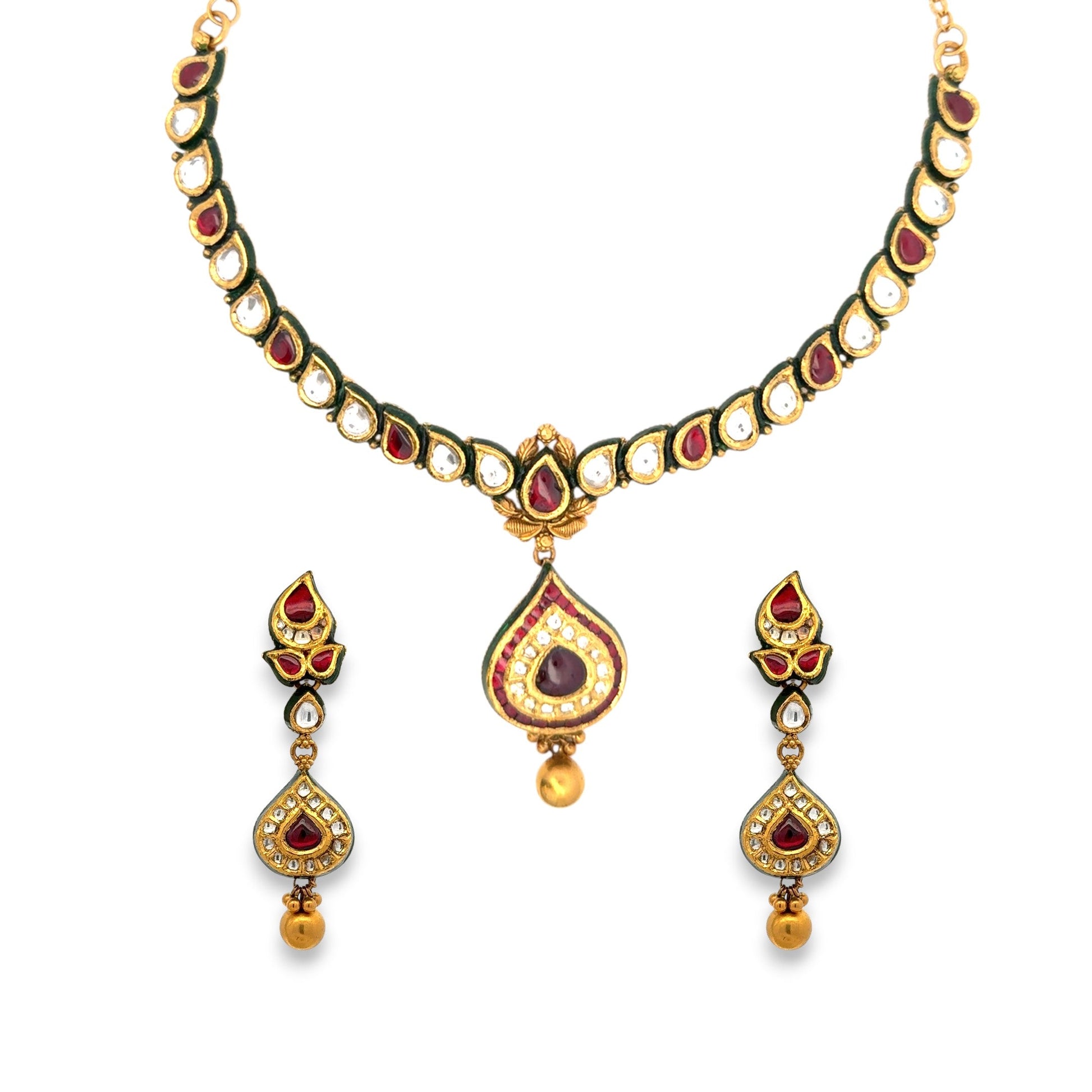 Elegant 22kt gold Kundan necklace set featuring teardrop motifs with red and white polki stones, green enamel edging, and matching earrings. Ideal for bridal, festive, and traditional occasions from Regal Jewels Chicago.