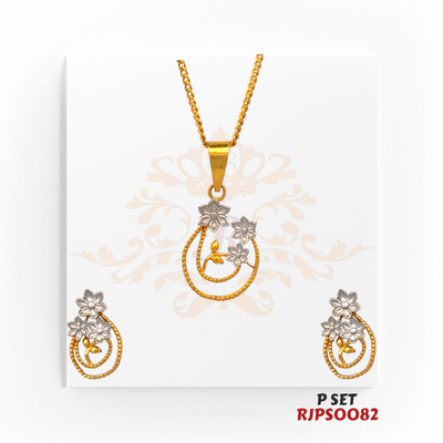 Regal Jewels (SKU: RJPS0082)Embrace delicate beauty with this charming gold-plated pendant and earring set. Featuring elegant floral motifs in a graceful two-tone design, this set brings a fresh, feminine touch to any outfit. Perfect for casual elegance or special occasions!