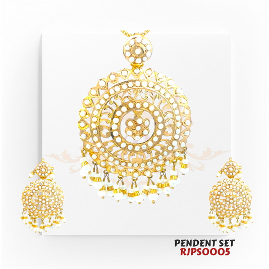 22kt Gold Kundan Chandbali Pendant Set RJPS0005 – A 21.30-gram gold pendant set with intricate Kundan craftsmanship and pearl embellishments. Available at Regal Jewels.