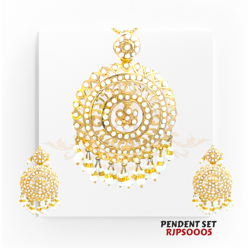 22kt Gold Kundan Chandbali Pendant Set RJPS0005 – A 21.30-gram gold pendant set with intricate Kundan craftsmanship and pearl embellishments. Available at Regal Jewels.