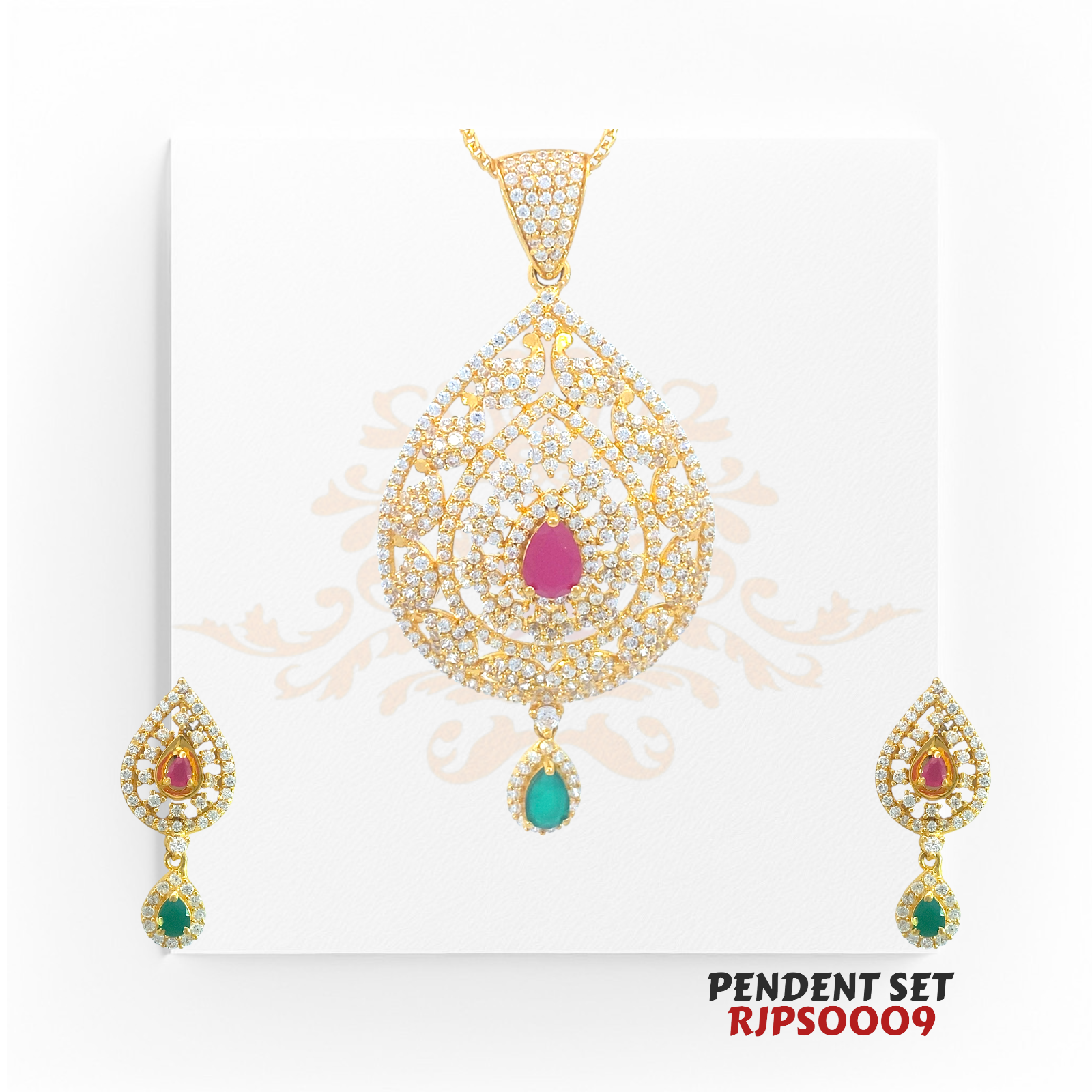 2kt Gold Ruby & Emerald CZ Pendant Set RJPS0009 – A 22.90-gram gold pendant set featuring a teardrop design, pear-cut ruby, emerald drop, and CZ embellishments. Available at Regal Jewels.
