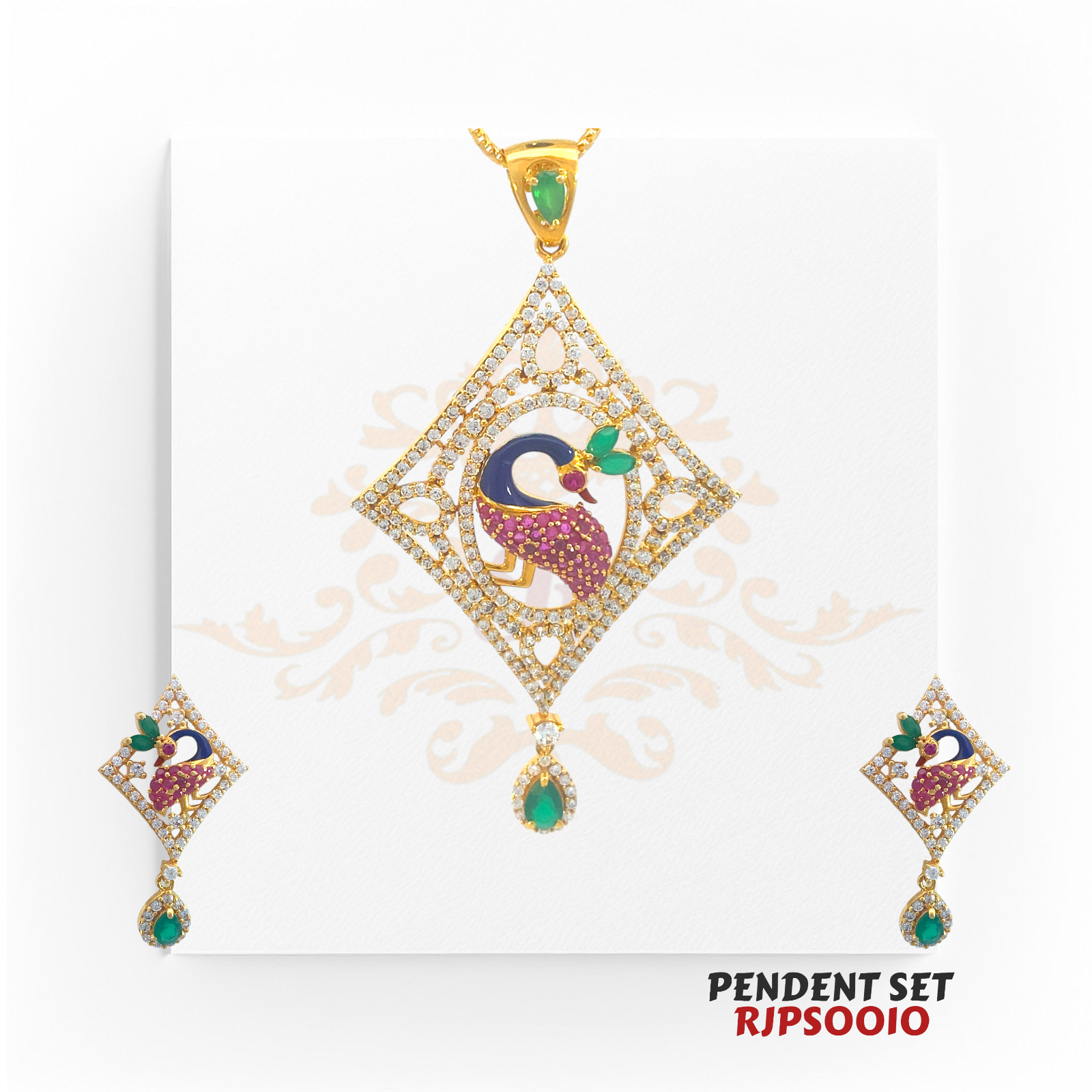 22kt Gold & CZ Peacock Pendant Set RJPS0010 – A 15.90-gram statement gold pendant set featuring a peacock motif, CZ stones, and emerald accents. Available at Regal Jewels.