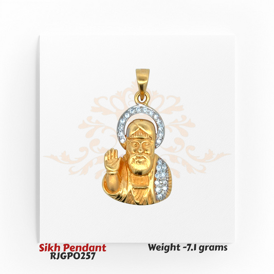 22kt Gold Guru Nanak Dev Ji Sikh Pendant with diamond halo, representing peace, wisdom, and faith – Regal Jewels Chicago.