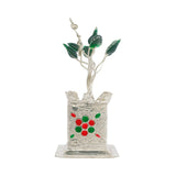 Regal Jewels silver Tulsi plant RJSPI0127 – handcrafted silver pooja decor with green enamel leaves and red floral design, perfect for temple, home décor, and gifting.