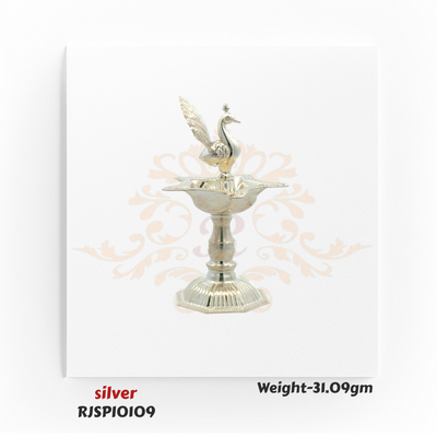 Beautiful silver pooja lamp with wide oil holder, ideal for daily prayer, Diwali celebrations, and gifting to loved ones during festivals.