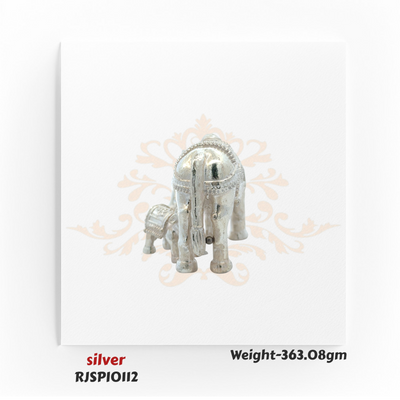 Handcrafted silver cow with calf statue RJSPI0112, ideal for temples, festive rituals, and auspicious religious gifting.