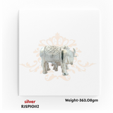 Pure silver Kamdhenu cow and calf figurine RJSPI0112, sacred Hindu idol for wealth, prosperity, and spiritual worship.