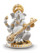 Veena Ganesha Figurine. Golden Lustre