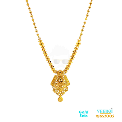 The 22kt gold chain set features a top half chain that consists of gold balls and a bottom half chain that is attached to a pendant. The bottom half chain goes through a gold ring, which adds an interesting design element to the piece. Weight: 24.10gm Length of Necklace and Earring 21.50/3.50cm