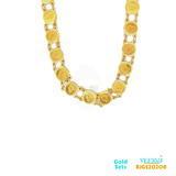 The 22kt gold coin set is a beautiful piece of jewelry crafted entirely from yellow gold. The necklace features coins attached between thin links, creating a unique and textured look to the piece.  Weight: 22.30gm, Length of Necklace and Earring 21.50/3.80cm