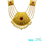 A 22kt gold traditional Punjabi Peepli Pata set with a red stone in the middle of the pendant and hanging pearls is cherished piece of jewelry 153.3 gm