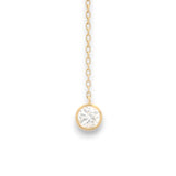 closeup of 18KT yellow gold diamond drop chain with bezel-set round brilliant diamond pendant by Regal Jewels