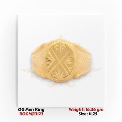 Men’s gold ring top view featuring hand-carved oval face with symmetrical engraved pattern.