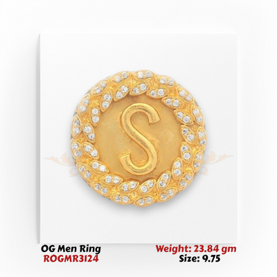 Men’s gold ring with S initial, diamond-studded circular top, heavy luxury design, angled side view.