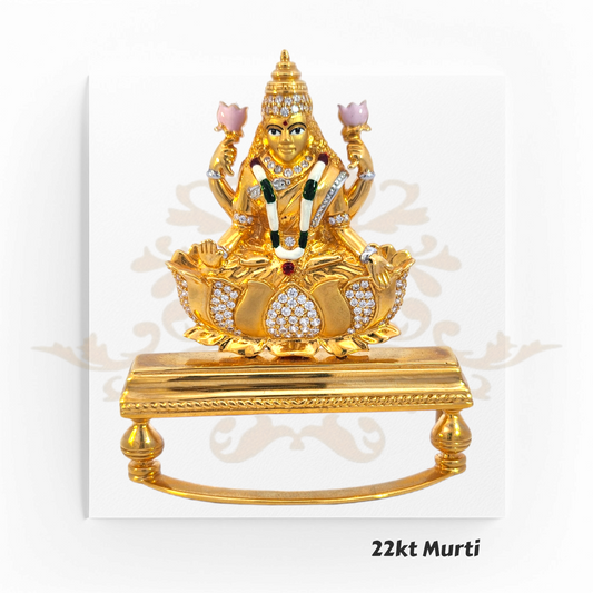 22kt Gold Laxmi Murti – A 49.1-gram divine idol of Goddess Laxmi seated on a lotus, symbolizing prosperity & wealth. Available at Regal Jewels.