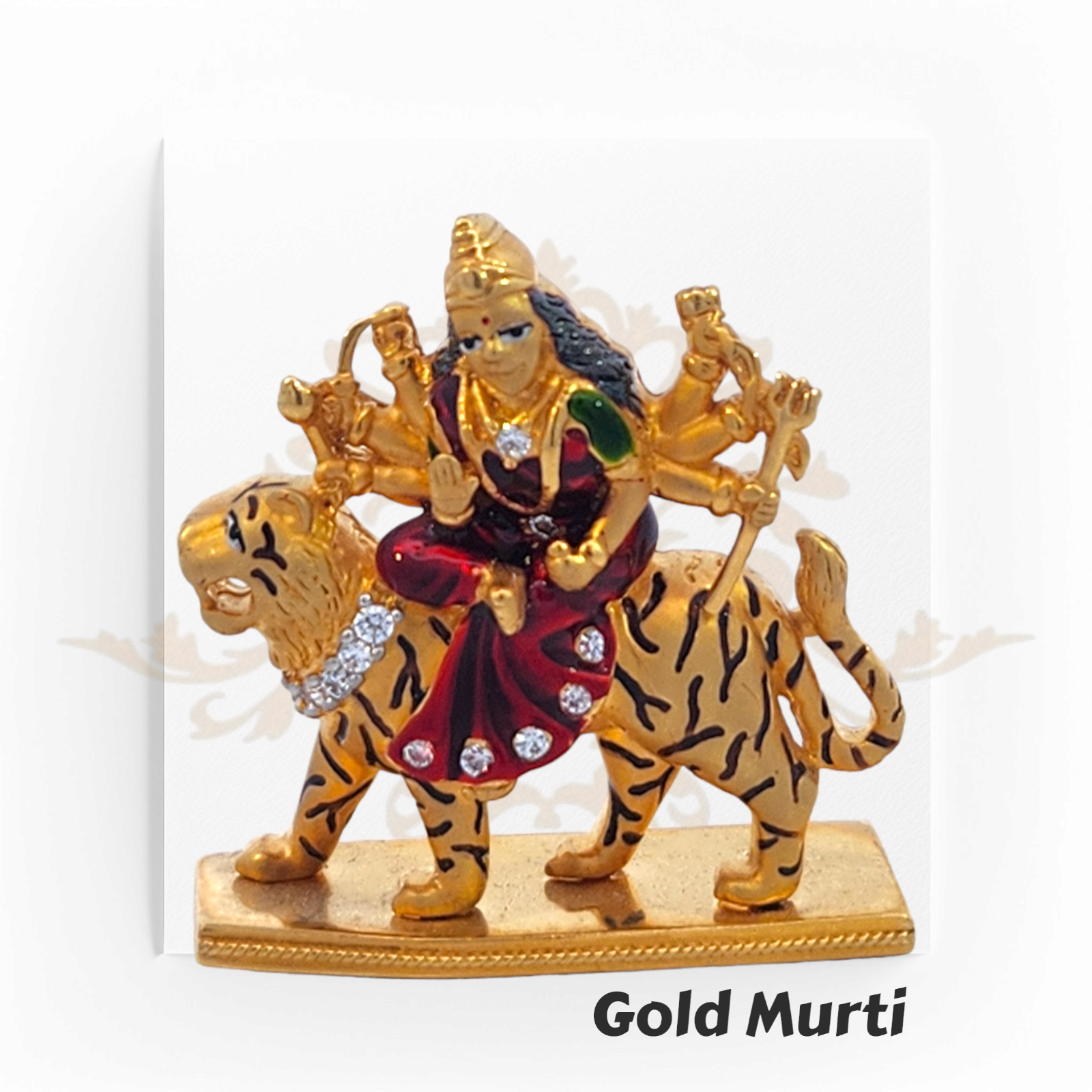 22kt Gold Durga Mata Murti – A 19.9-gram idol of Goddess Durga riding a tiger, featuring fine gold detailing & vibrant enamel. Available at Regal Jewels.