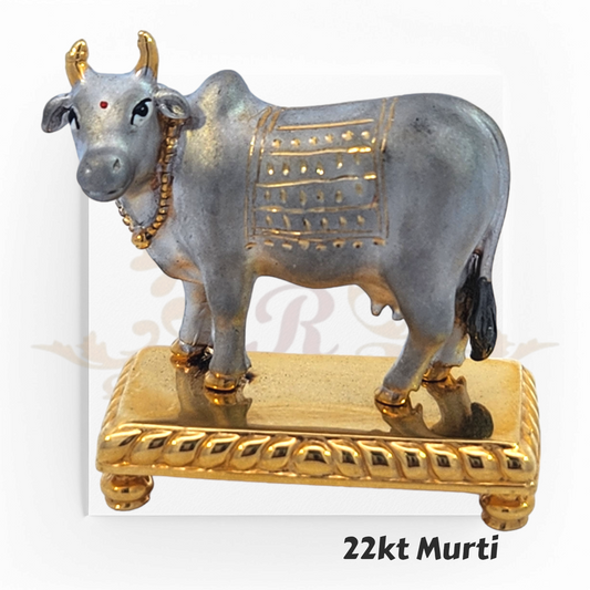 22kt Gold Kamdhenu Cow Murti – A 14.8-gram sacred idol with gold & silver detailing, representing prosperity & divine blessings. Available at Regal Jewels.