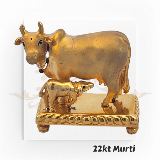 22kt Gold Cow & Calf Murti – A 15.5-gram divine Gaumata idol crafted in pure gold, symbolizing blessings, motherhood, and spirituality. Available at Regal Jewels.