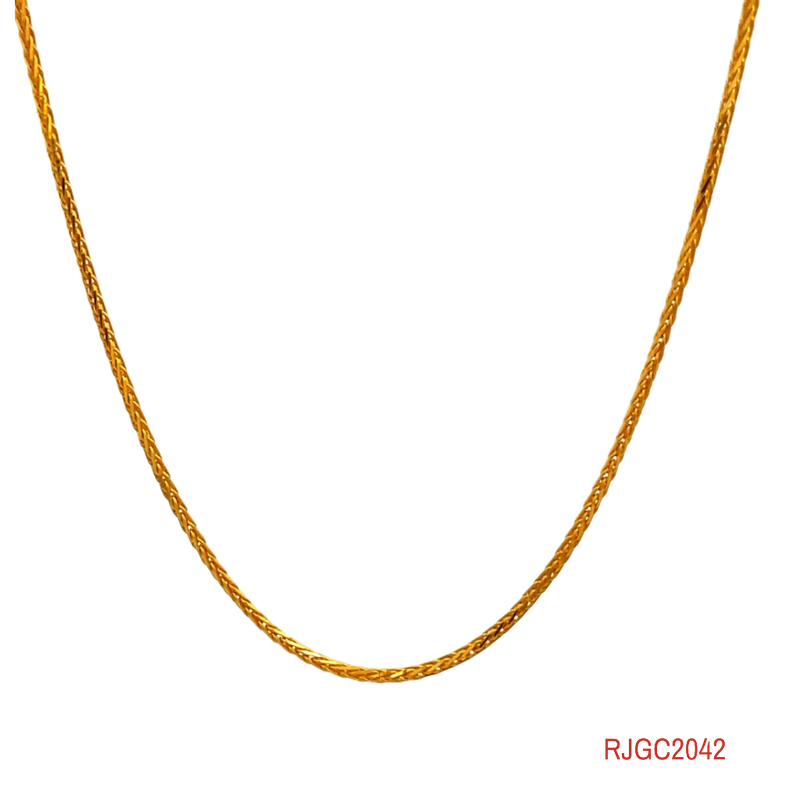 The Gold Chain RJGC2042, a sleek 22kt yellow gold curb chain. This chain is 15 inches long with a thickness of 2.7mm. It is secured with a lobster clasp for a secure closure. Weighing 4.30 grams, it features a modern and stylish design, perfect for adding a touch of sophistication to any ensemble.