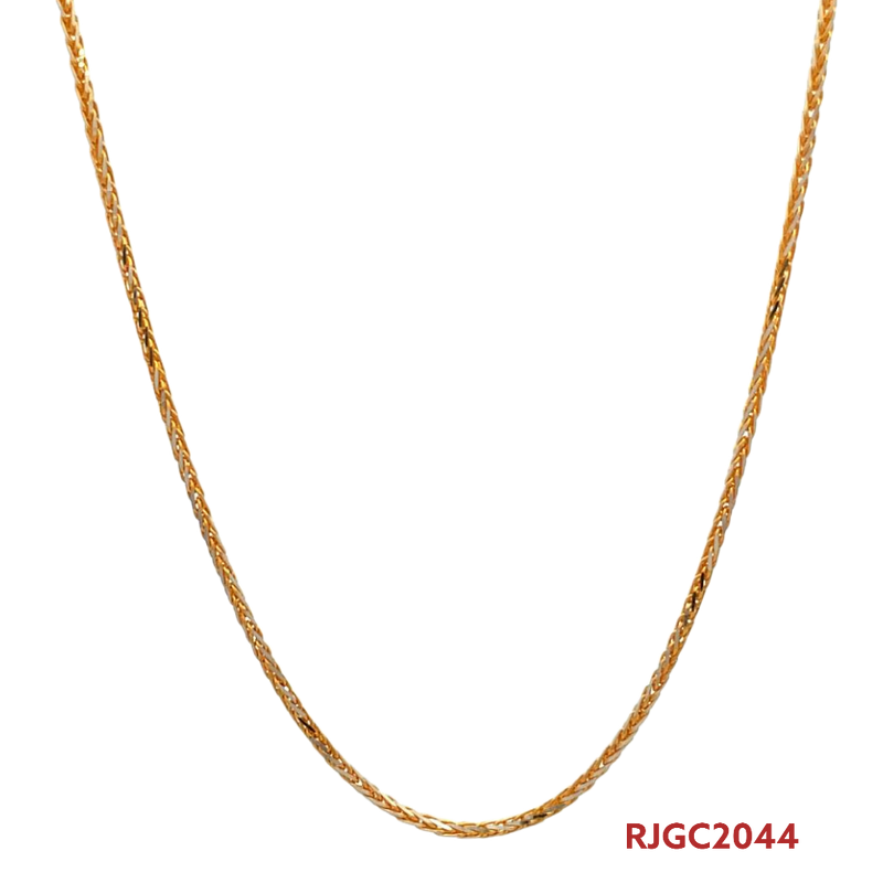 The Gold Chain RJGC2044, a two-tone chain featuring 22kt yellow gold and rhodium. This chain measures 15 inches in length and has a thickness of 1.4mm. It is secured with a lobster clasp for a secure closure. Weighing 5.6 grams, this chain showcases a unique and stylish design with its two-tone composition, adding a touch of sophistication to any look.