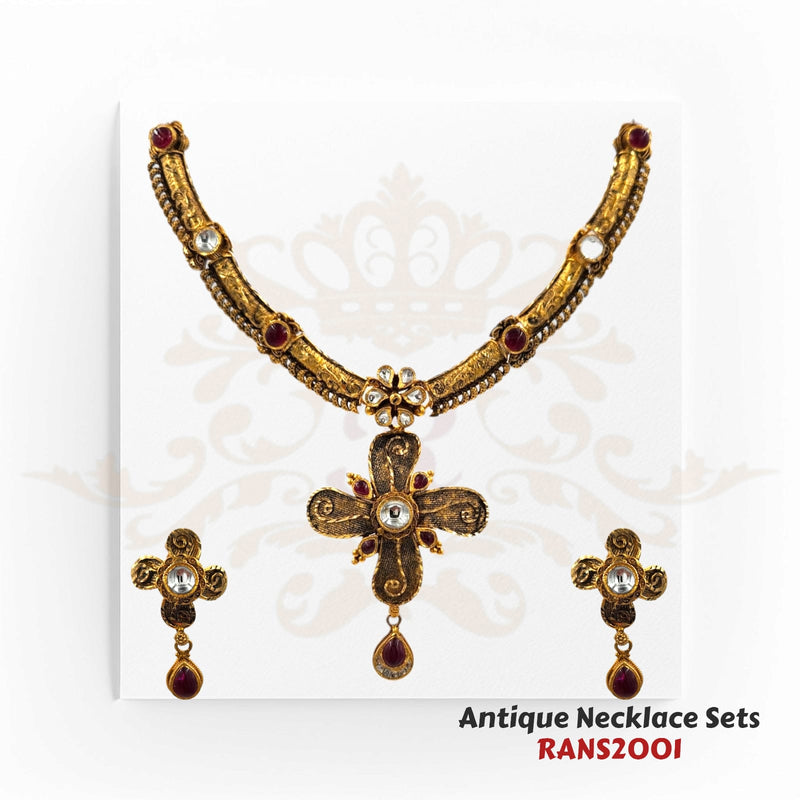 22k gold Antique Gold Necklace Set, featuring a small-sized pendant and matching earrings. This intricately designed jewelry set combines the beauty of oxidized detailing, kundan work, and a pedals shape pendant to create a captivating ensemble.