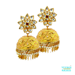 A 22kt gold Jhumka with screw back post, Kundan work on the top post, small pearls, and thin diamond cut out hangings is a beautiful and intricate piece of jewelry. Weight: 33.00 gm Height: 4.5cm Width: 2.5cm