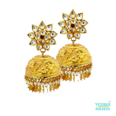 A 22kt gold Jhumka with screw back post, Kundan work on the top post, small pearls, and thin diamond cut out hangings is a beautiful and intricate piece of jewelry. Weight: 33.00 gm Height: 4.5cm Width: 2.5cm