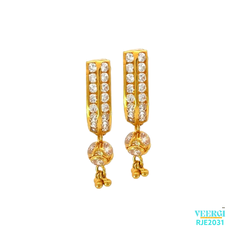 The 22kt gold tops with cubic zirconia set in 2 parallel lines, hanging balls with cubic zirconia, and latkans is a stunning and luxurious piece of jewelry. This earring belongs to the Tops Earrings collection with the code RJE2031. It weighs 2.60 grams and has a height of 2.5cm and a width of 0.5cm.